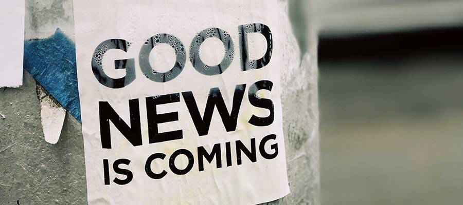 A sign that reads: "Good News is Coming".